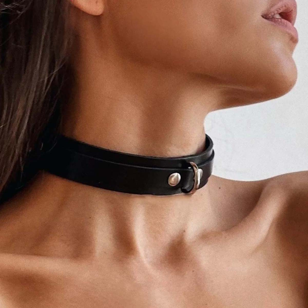 BDSM leather collar with leash